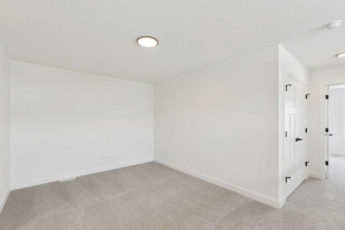 93 Heritage Park, Cochrane, AB - Indoor Photo Showing Other Room