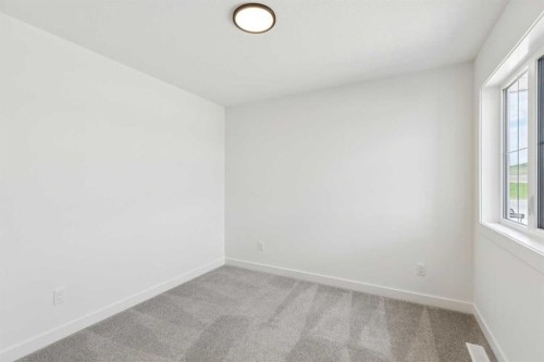 93 Heritage Park, Cochrane, AB - Indoor Photo Showing Other Room