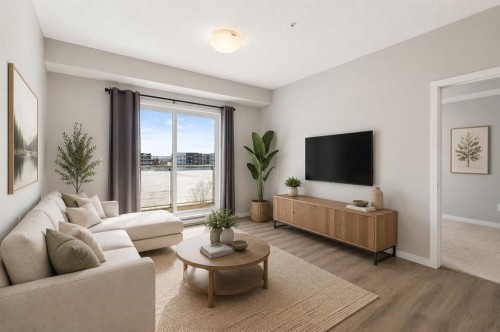305-20 Seton Park Se, Calgary, AB - Indoor Photo Showing Living Room