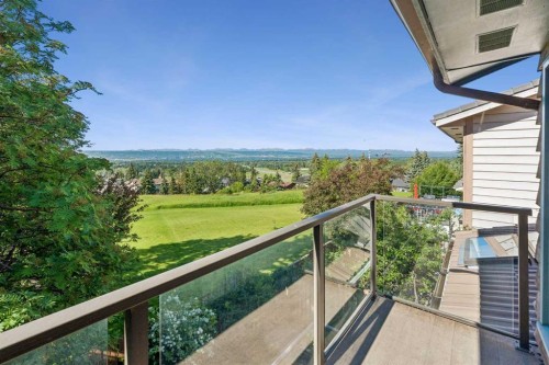 31 Edgehill Bay Nw, Calgary, AB - Outdoor With Balcony With View With Exterior