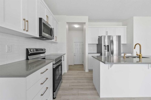 40 Carringham Gate Nw, Calgary, AB - Indoor Photo Showing Kitchen With Stainless Steel Kitchen With Upgraded Kitchen