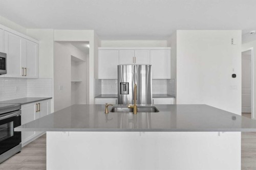40 Carringham Gate Nw, Calgary, AB - Indoor Photo Showing Kitchen With Stainless Steel Kitchen With Upgraded Kitchen