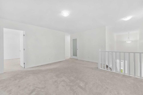 40 Carringham Gate Nw, Calgary, AB - Indoor Photo Showing Other Room