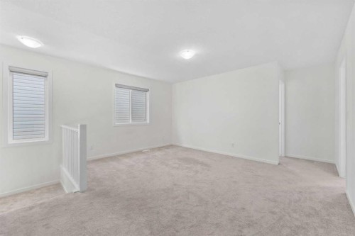 40 Carringham Gate Nw, Calgary, AB - Indoor Photo Showing Other Room