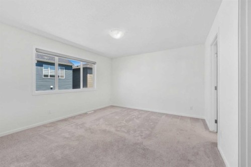 40 Carringham Gate Nw, Calgary, AB - Indoor Photo Showing Other Room