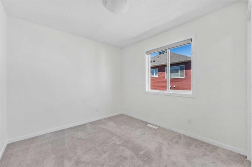 40 Carringham Gate Nw, Calgary, AB - Indoor Photo Showing Other Room
