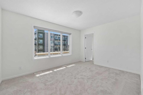 40 Carringham Gate Nw, Calgary, AB - Indoor Photo Showing Other Room