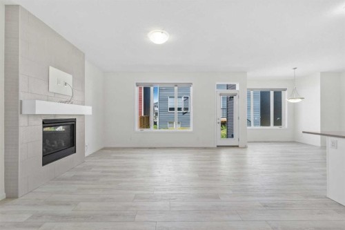 40 Carringham Gate Nw, Calgary, AB - Indoor Photo Showing Living Room With Fireplace