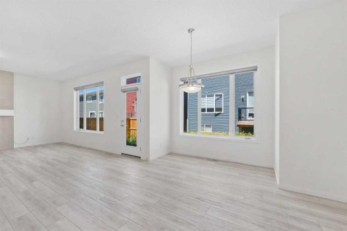 40 Carringham Gate Nw, Calgary, AB - Indoor With Fireplace