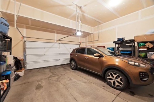 76 Red Embers Square Ne, Calgary, AB - Indoor Photo Showing Garage