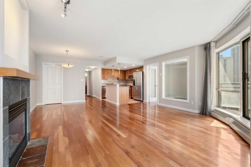 804-1088 6 Avenue Sw, Calgary, AB - Indoor Photo Showing Other Room With Fireplace