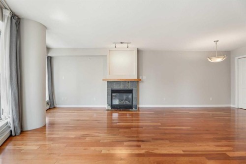 804-1088 6 Avenue Sw, Calgary, AB - Indoor With Fireplace