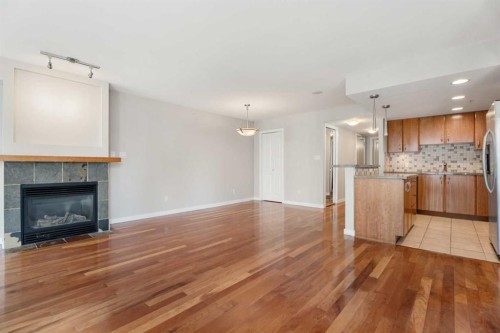 804-1088 6 Avenue Sw, Calgary, AB - Indoor With Fireplace