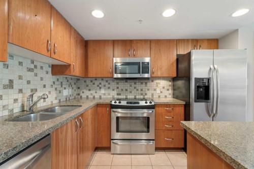 804-1088 6 Avenue Sw, Calgary, AB - Indoor Photo Showing Kitchen With Stainless Steel Kitchen With Double Sink