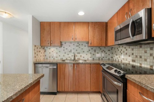 804-1088 6 Avenue Sw, Calgary, AB - Indoor Photo Showing Kitchen With Stainless Steel Kitchen With Double Sink