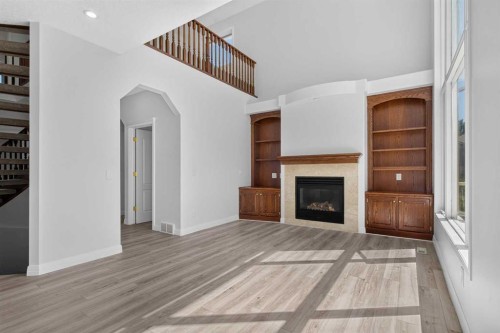 78 Hamptons Circle Nw, Calgary, AB - Indoor With Fireplace