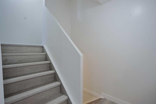 205-310 Falconridge Crescent Ne, Calgary, AB - Indoor Photo Showing Other Room