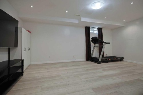 205-310 Falconridge Crescent Ne, Calgary, AB - Indoor Photo Showing Gym Room