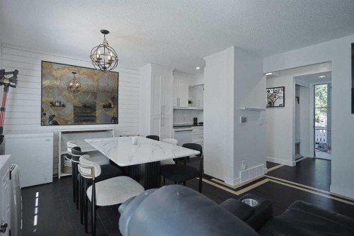 205-310 Falconridge Crescent Ne, Calgary, AB - Indoor Photo Showing Dining Room