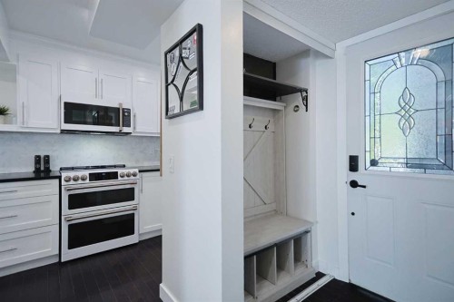205-310 Falconridge Crescent Ne, Calgary, AB - Indoor Photo Showing Kitchen