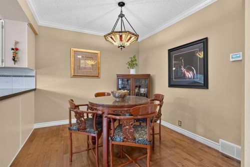 12-140 Point Drive Nw, Calgary, AB - Indoor Photo Showing Dining Room