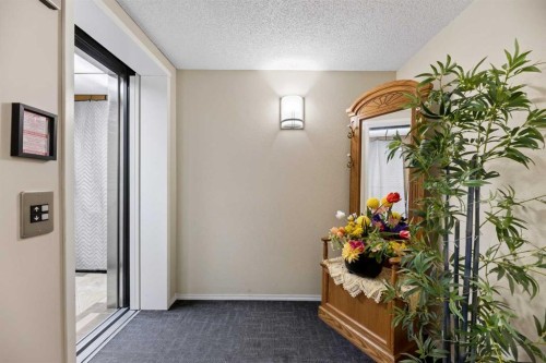 210-4514 54 Avenue, Olds, AB - Indoor Photo Showing Other Room