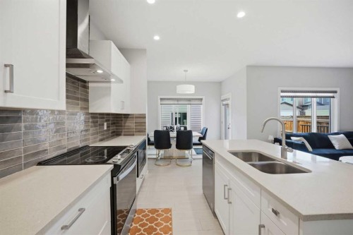 232 Cornerbrook Common Ne, Calgary, AB - Indoor Photo Showing Kitchen With Double Sink With Upgraded Kitchen
