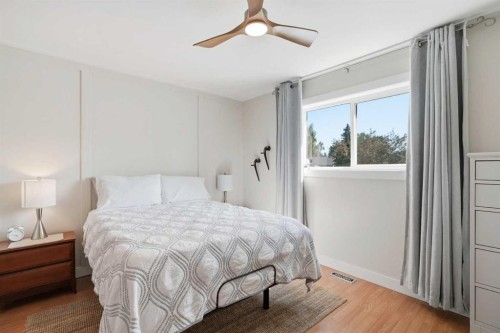 19 Millcrest Way Sw, Calgary, AB - Indoor Photo Showing Bedroom