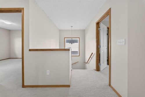 744 Luxstone Landing Sw, Airdrie, AB - Indoor Photo Showing Other Room