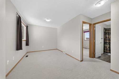 744 Luxstone Landing Sw, Airdrie, AB - Indoor Photo Showing Other Room