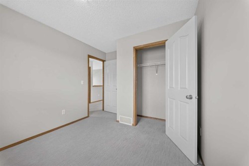 744 Luxstone Landing Sw, Airdrie, AB - Indoor Photo Showing Other Room