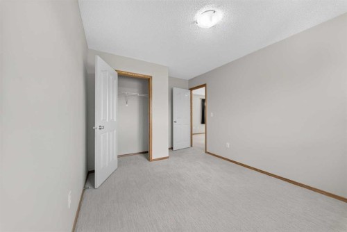 744 Luxstone Landing Sw, Airdrie, AB - Indoor Photo Showing Other Room