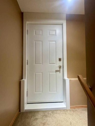 744 Luxstone Landing Sw, Airdrie, AB - Indoor Photo Showing Other Room