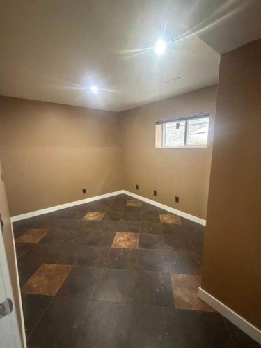 744 Luxstone Landing Sw, Airdrie, AB - Indoor Photo Showing Other Room