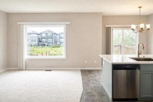 744 Luxstone Landing Sw, Airdrie, AB - Indoor Photo Showing Kitchen