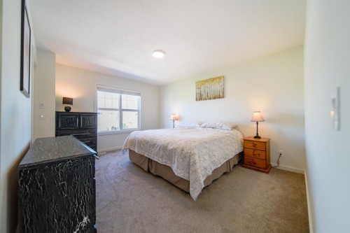 61-1407 3 Street Se, High River, AB - Indoor Photo Showing Bedroom