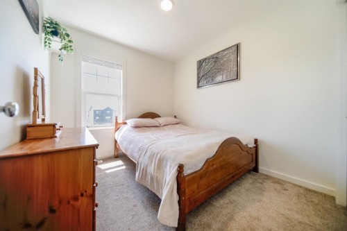 61-1407 3 Street Se, High River, AB - Indoor Photo Showing Bedroom
