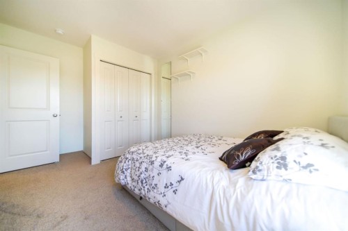 61-1407 3 Street Se, High River, AB - Indoor Photo Showing Bedroom