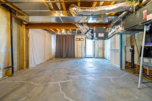 61-1407 3 Street Se, High River, AB - Indoor Photo Showing Basement