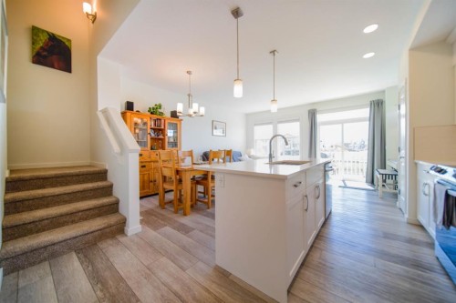 61-1407 3 Street Se, High River, AB - Indoor Photo Showing Kitchen With Upgraded Kitchen