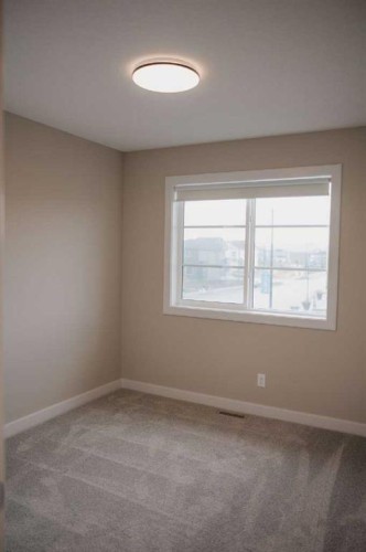 282 Southbow Avenue, Cochrane, AB - Indoor Photo Showing Other Room