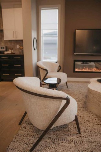 282 Southbow Avenue, Cochrane, AB - Indoor With Fireplace