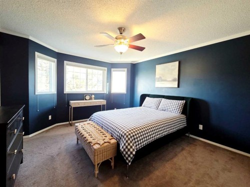 48 Covepark Place Ne, Calgary, AB - Indoor Photo Showing Bedroom