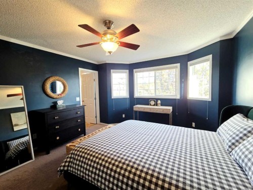48 Covepark Place Ne, Calgary, AB - Indoor Photo Showing Bedroom
