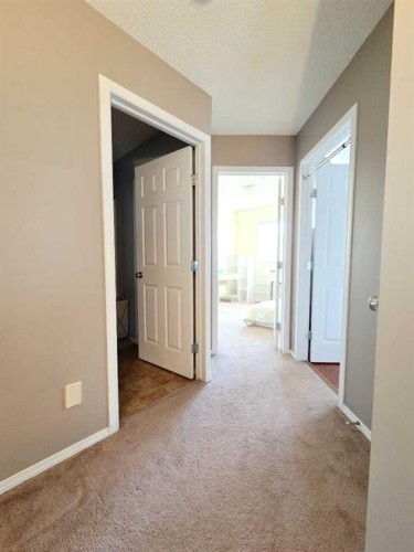 48 Covepark Place Ne, Calgary, AB - Indoor Photo Showing Other Room