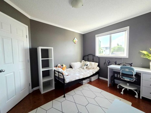 48 Covepark Place Ne, Calgary, AB - Indoor Photo Showing Bedroom