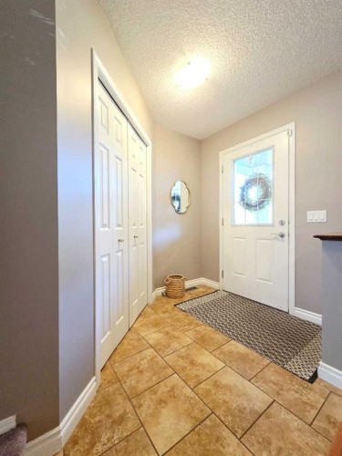 48 Covepark Place Ne, Calgary, AB - Indoor Photo Showing Other Room