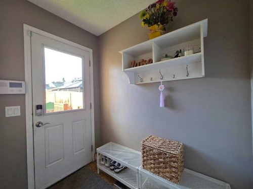 48 Covepark Place Ne, Calgary, AB - Indoor Photo Showing Other Room