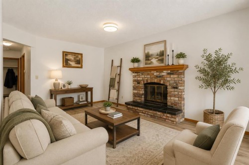 132 Scenic Cove Circle Nw, Calgary, AB - Indoor Photo Showing Living Room With Fireplace