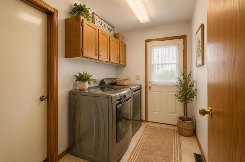132 Scenic Cove Circle Nw, Calgary, AB - Indoor Photo Showing Laundry Room